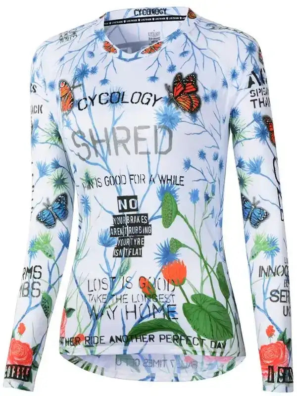 Women's long sleeve cycling jersey with butterfly and floral print, bold text design for road biking