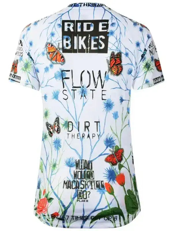 White cycling jersey with butterfly and floral print, 'Ride Bikes' and 'Flow State' text, men's bike apparel
