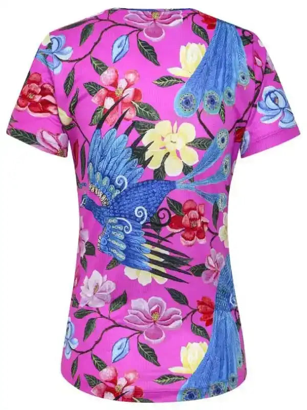 Vibrant pink women's cycling jersey with blue peacock and floral print, perfect for bike rides.