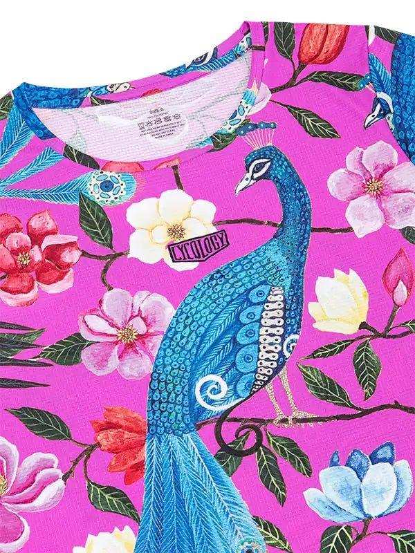 Vibrant pink cycling jersey with blue peacock and floral print, featuring unique design for women's cycling wear