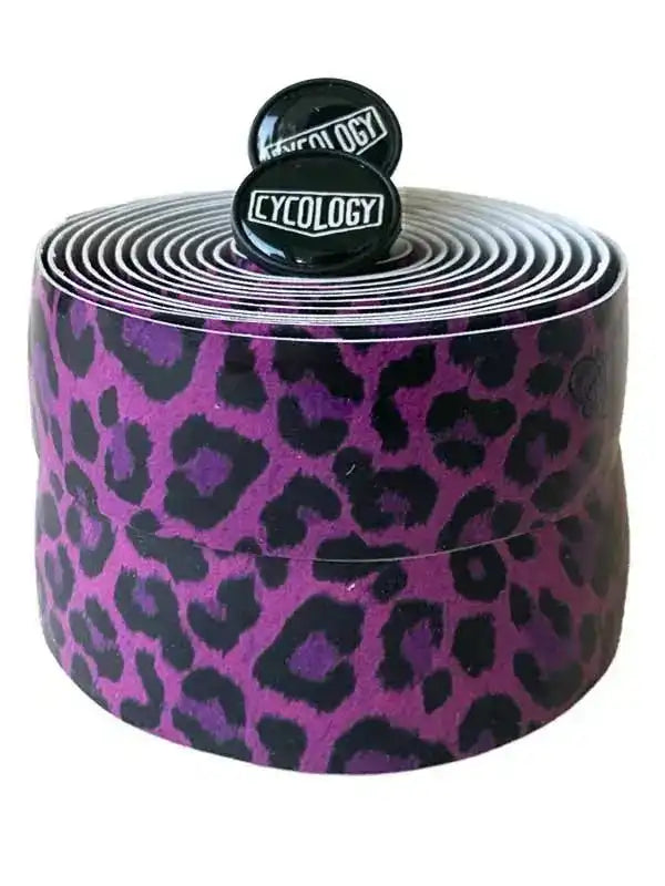 Purple leopard print bike handlebar tape with Cycology logo caps