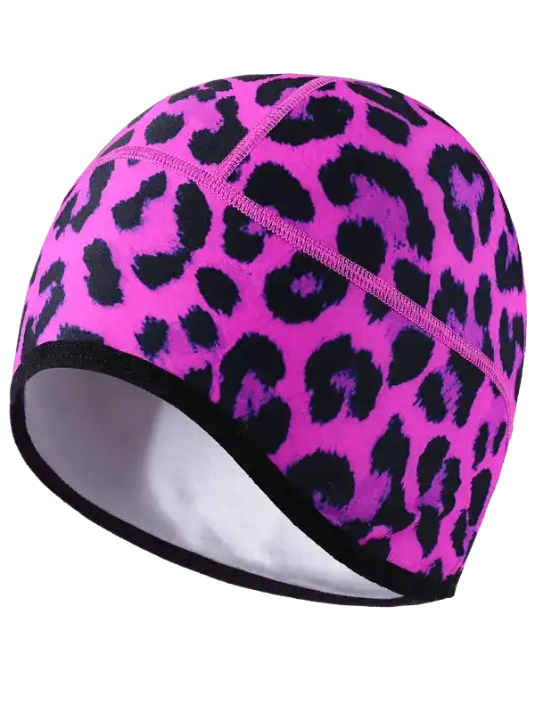 Pink leopard print cycling skull cap with black trim and white lining for women's bike wear