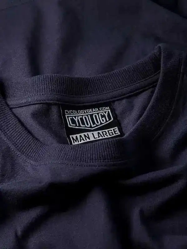 Cycology men's large cycling t-shirt tag, dark fabric, brand label visible
