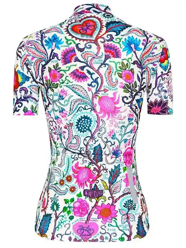 Women's cycling jersey with vibrant floral and bicycle print, short sleeves, back view
