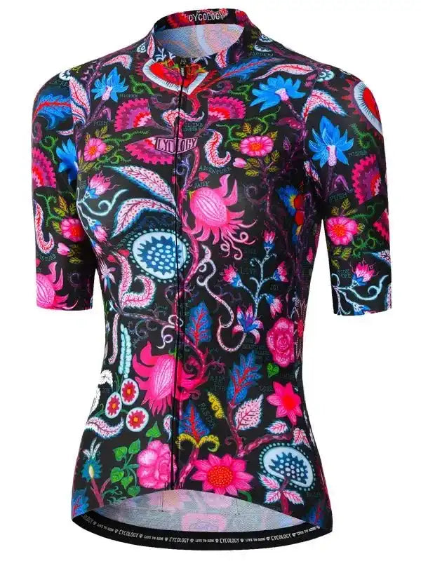 Women's cycling jersey with vibrant floral and paisley print on black, featuring full zip and short sleeves.