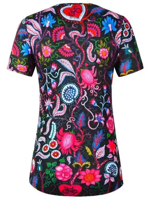 Women's cycling jersey with vibrant floral and heart pattern on black background, short sleeve design