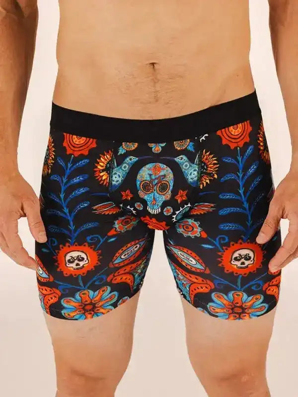 Men's cycling shorts with vibrant sugar skull and floral print, ideal for cycling apparel