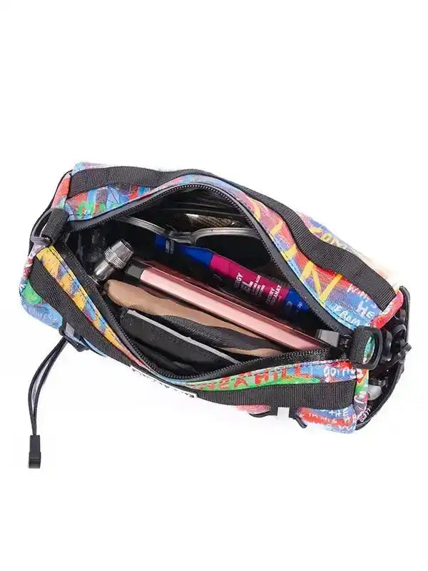 Colorful cycling accessory pouch with pens, phone, and tools inside, perfect for bike rides