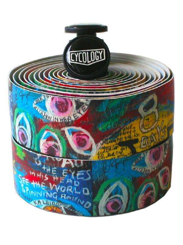 Colorful Cycology bike handlebar tape with artistic eye designs and text patterns for cycling gear