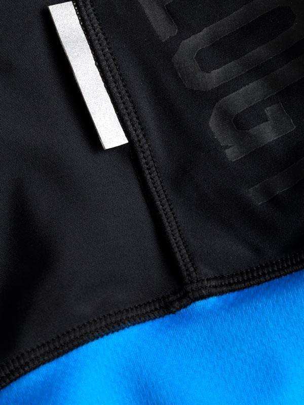 Black and blue cycling jersey with reflective strip and textured logo detail