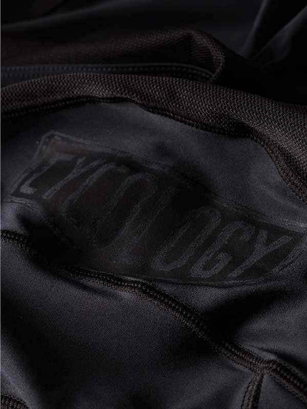Black cycling jersey with subtle logo, high-quality fabric detail for men's and women's rides