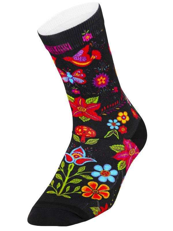 Colorful floral and bird pattern cycling sock on black background, vibrant design for bike rides