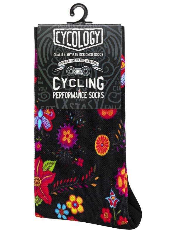 Black cycling performance socks with vibrant floral pattern, designed for bike culture and lifestyle