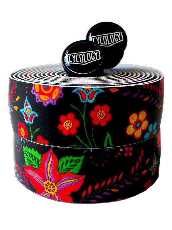 Colorful floral bike handlebar tape with Cycology branding, vibrant patterns on black background