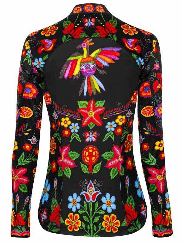 Women's cycling jersey with vibrant floral and bird print on black fabric, long sleeves, unique design