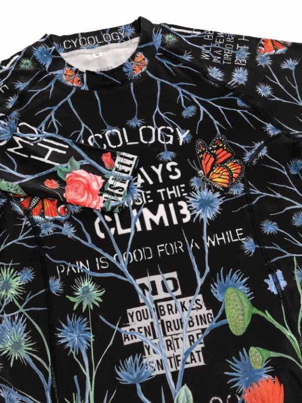 Black cycling jersey with floral and butterfly print, motivational cycling quotes, and 'Cycology' branding