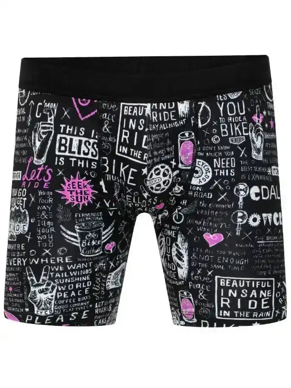 Men's cycling shorts with bold pink and white graphic print, featuring bike-themed quotes and icons on black fabric.