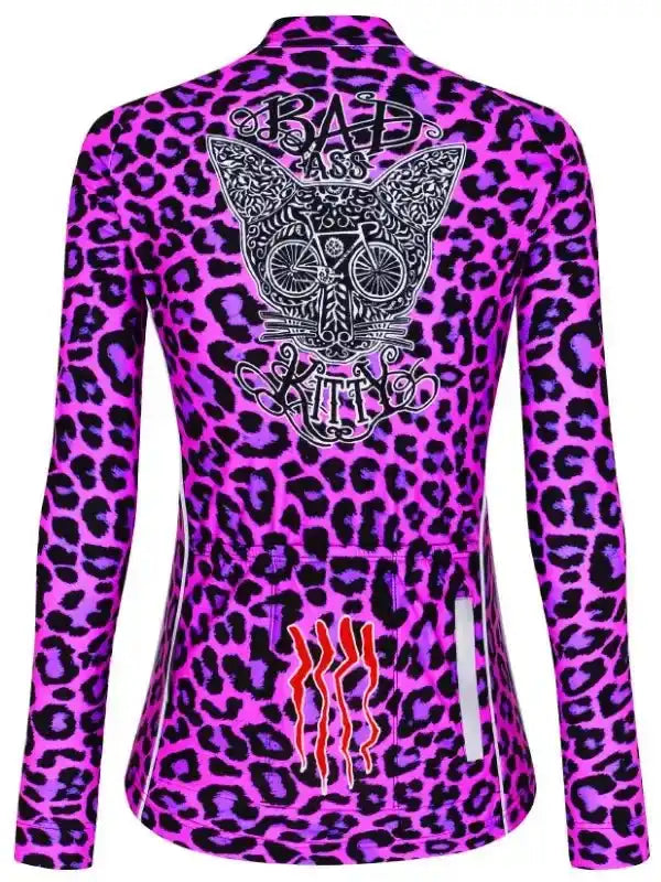 Women's cycling jersey with pink leopard print, 'Bad Ass Kitty' graphic, and reflective details