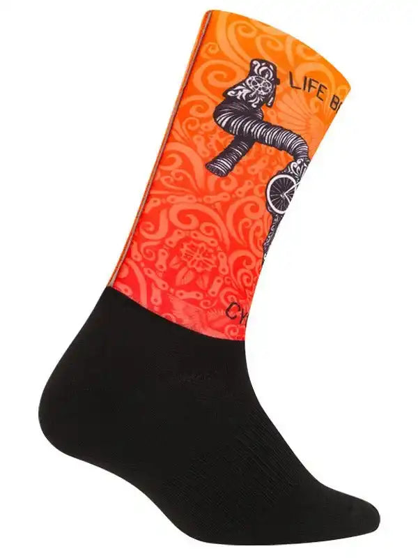 Orange cycling sock with black cyclist graphic and swirl pattern, ideal for bike rides