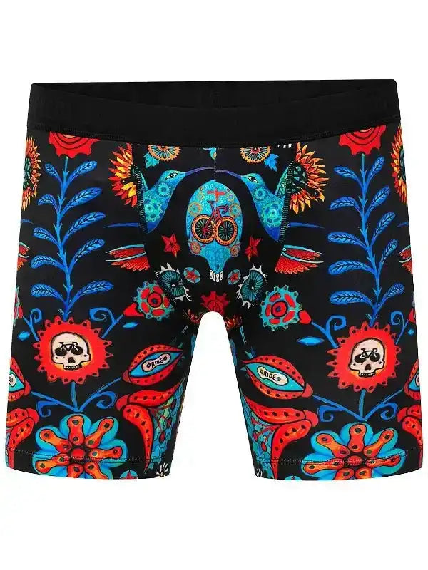 Men's cycling shorts with vibrant sugar skull and floral print, bold colors, unique design