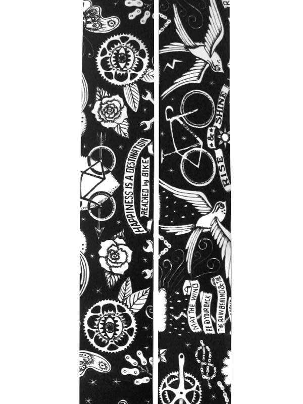 Black and white cycling-themed fabric with bikes, birds, roses, and motivational phrases for cycling apparel.
