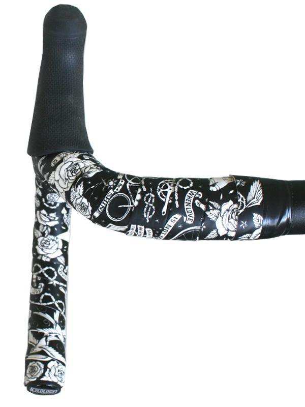 Black and white tattoo-style bike handlebar tape with roses and cycling motifs