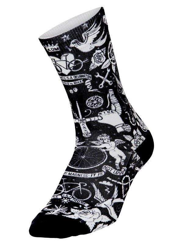 Black and white cycling socks with tattoo-style graphics including bikes, roses, and wings