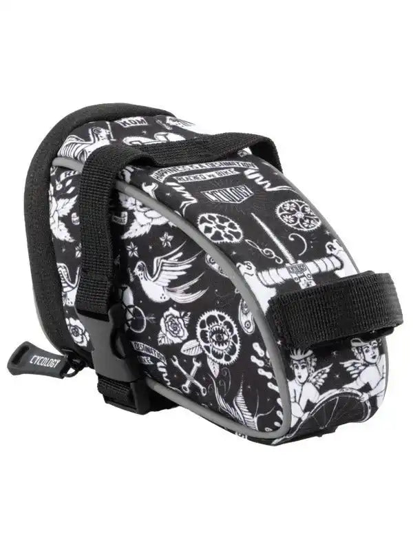 Black and white tattoo-style cycling saddle bag with angel, bird, and gear designs, secure straps